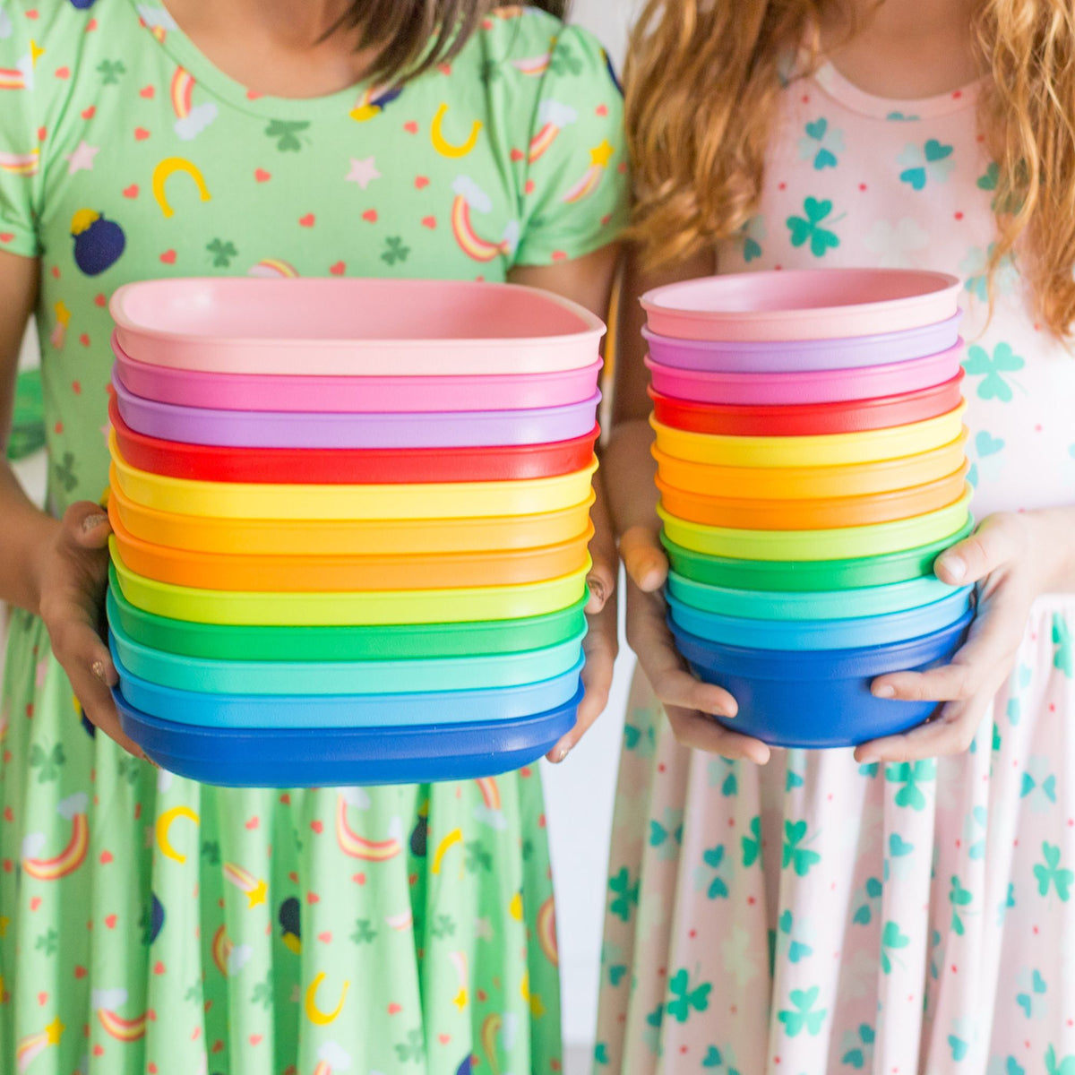 Mother holding her baby during playtime